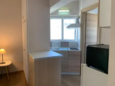 a kitchen with a sink and a counter top at Rivi Apartments in Athens