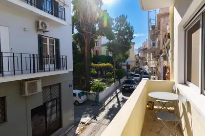an apartment balcony with a view of a street at Luxury Apartments at the foot of the Acropolis Hill in Athens