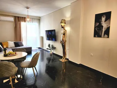 a living room with a mannequin in the middle of a room at Acropolis Suite greendom in Athens