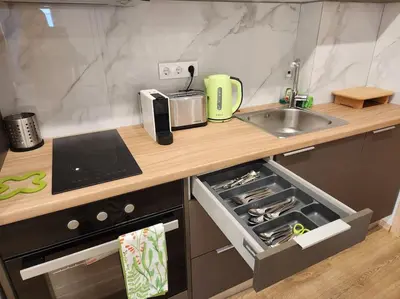 a kitchen with a sink and a stove top oven at Lux House Attiki VIPGreece in Athens
