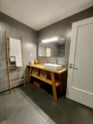 a bathroom with a sink and a mirror at Christina-Anna Athens City Center walking distance to everywhere and Acropolis, in One of the most Favorable Locations by National Gardens and Zoo, Hellenic Parliament in Syntagma and Stylish Exquisite Kolonaki Cozy Renovated Apartment in Athens