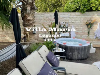 a backyard party with a hot tub and chairs at Villa Maria Lagonissi - Private Villa upstairs with exclusive access to pool & outside areas in Kalívia Thorikoú