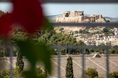 a view ofhenshenshenshenshens acropolis from the top of the ac at The Athenian Oasis in Athens