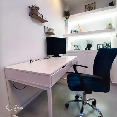 a white desk with a computer on it with a chair at Monastiraki Heart - Luxury Apartment Athens in Athens