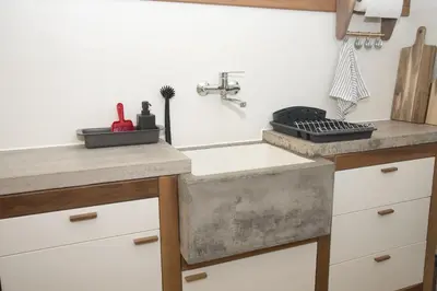a kitchen with a sink and a counter at Syntagma View Apartment in Athens