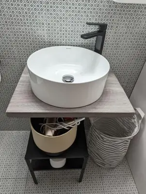 a white sink on a counter in a bathroom at Cozy apartm.near Metro Ag.Marina in Athens