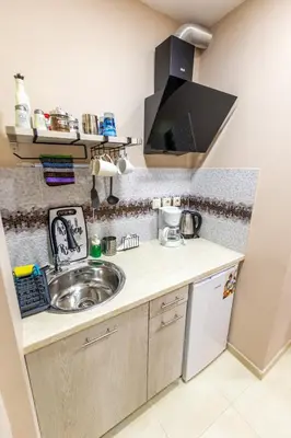 a kitchen with a sink and a counter at Oasis in the centre in Athens