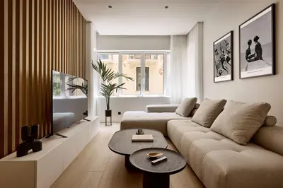 a living room with a couch and a table at Lime Residences, Syntagma by Aura Homes in Athens