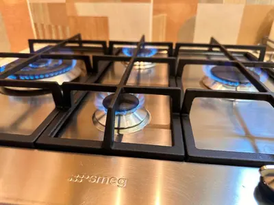 a group of burners on top of a stove at Sunny Apartment in Koukaki - Excellent spot in Athens