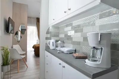 a kitchen with a mixer on a counter at Melina’s Flat in Athens